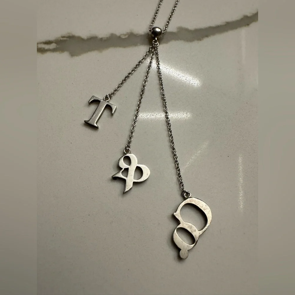 Tiffany & Co. Rare 925 Silver T&Co Dangle Letters Logo Pendant 16